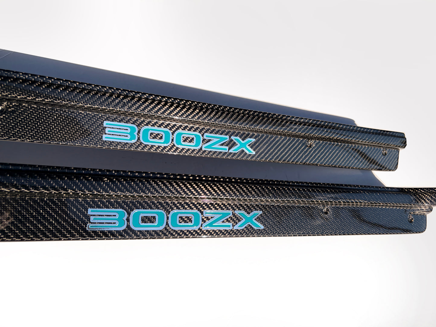 ZThirtyTwo Carbon Fiber Door Sills Teal Chrome Logos